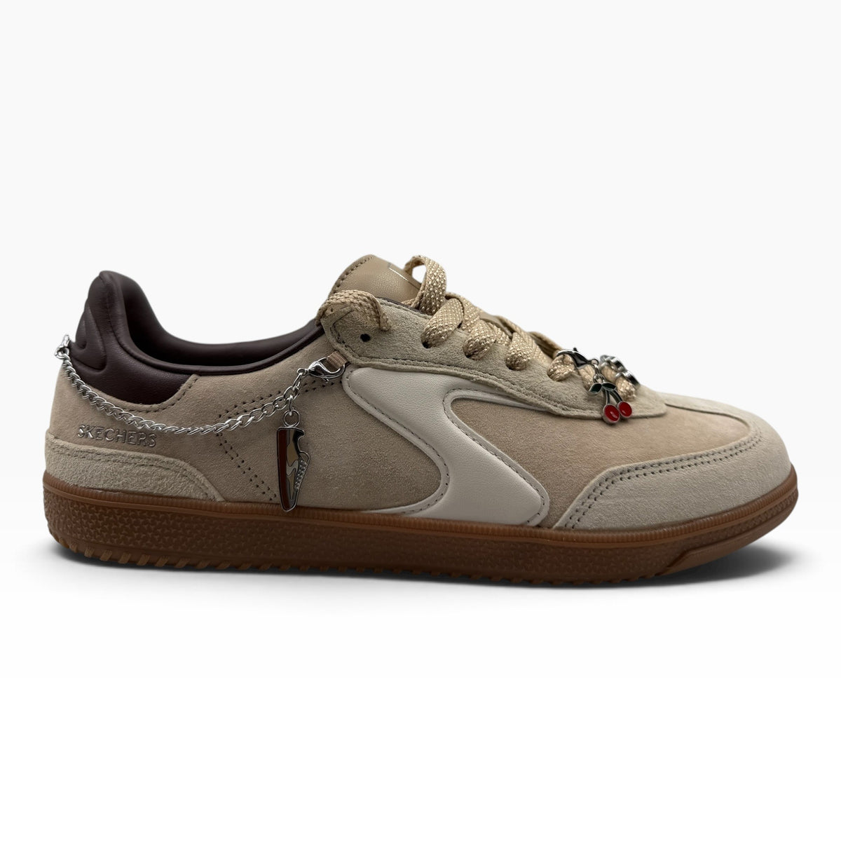 The Shoe Shop Skechers Hot Shot City Charm beige suede court sneaker with decorative charms and gum rubber sole.