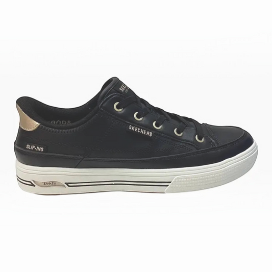 The Shoe Shop Skechers Arch Fit Arcade black canvas sneaker with white midsole, stretch laces, and gold heel detail.