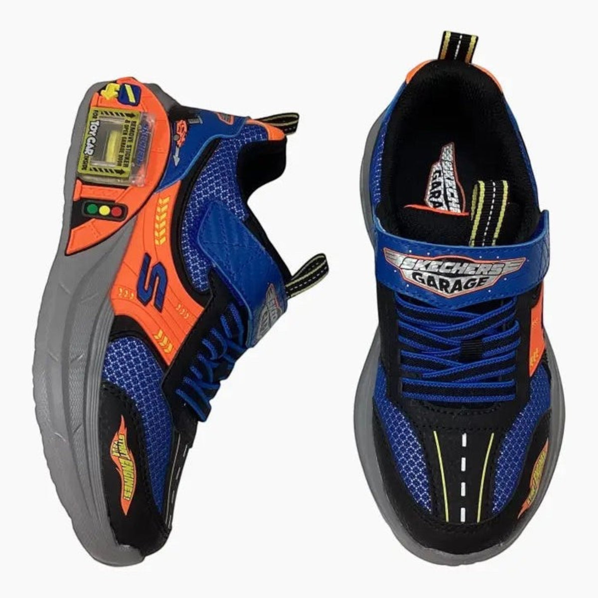 The Shoe Shop Skechers Garage sneakers in blue and black with car-themed graphics, toy garage midsole, and strap.