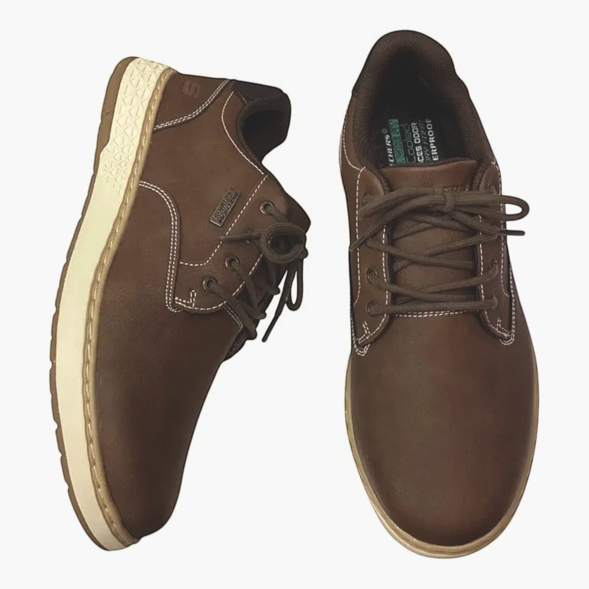 The Shoe Shop Skechers Garlan Pryor brown waterproof vegan leather lace-up shoes with memory foam insoles.