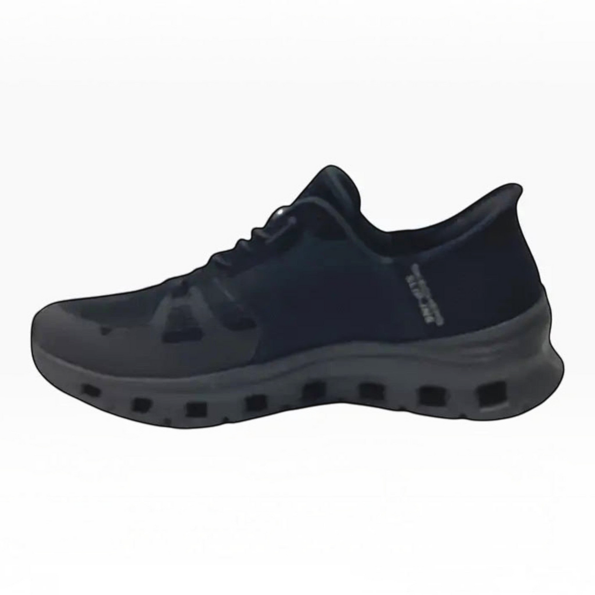 The Shoe Shop Skechers Glide Step Pro black mesh slip-in sneaker with geometric cushioned midsole and heel pillow.
