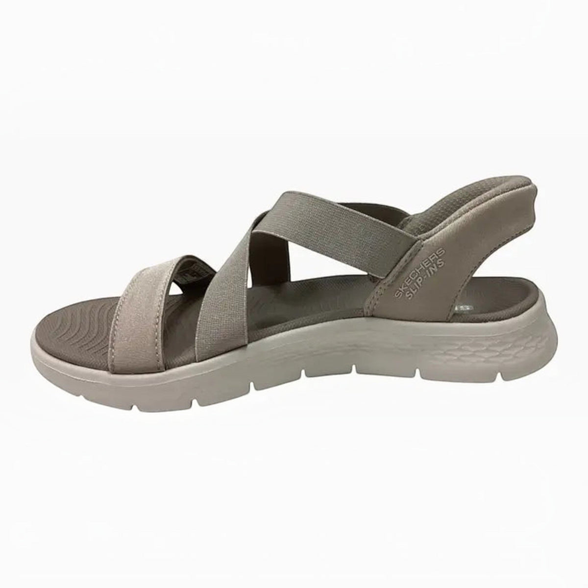 The Shoe Shop Skechers Go Walk Flex Glimmer Up slip-on sport sandal in taupe with shimmery straps and heel pillow.
