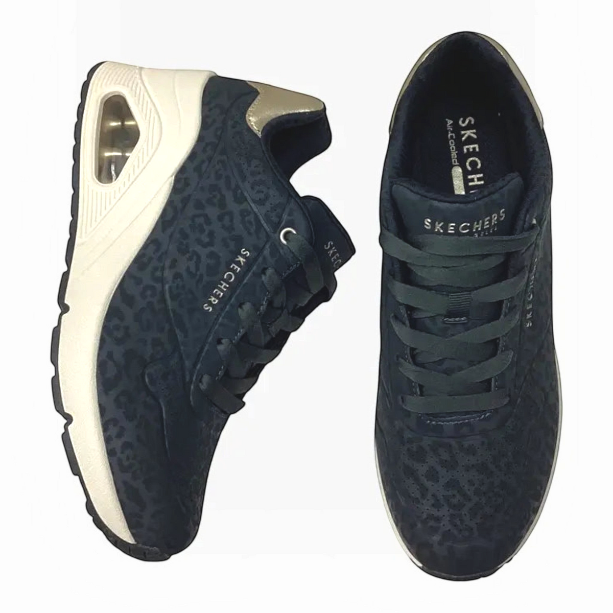 The Shoe Shop Skechers Uno Wedge Safari Daze sneakers in black leopard print with metallic heel and air-cushioned sole