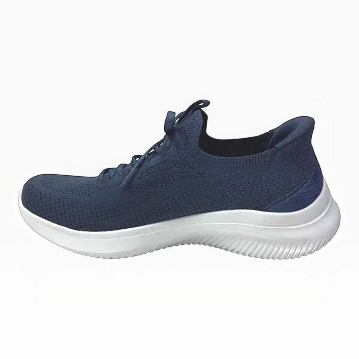 The Shoe Shop Skechers Ultra Flex 4.0 navy blue slip-on sneaker with engineered knit upper and white traction sole.