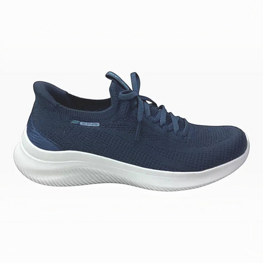 The Shoe Shop Skechers Ultra Flex 4.0 navy blue slip-on sneaker with white cushioned sole and knit upper.