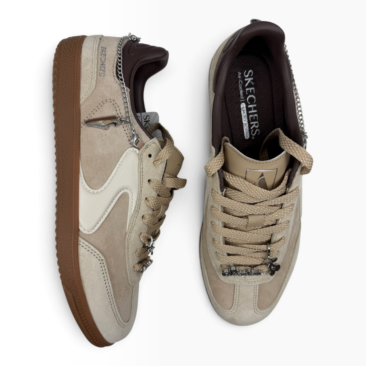 The Shoe Shop Skechers Hot Shot City Charm sneakers in beige pigskin suede with decorative charms and gum soles.