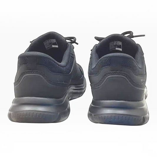 The Shoe Shop Skechers Track Ezral black slip-in sneakers showing the cushioned heel and mesh upper from the back.