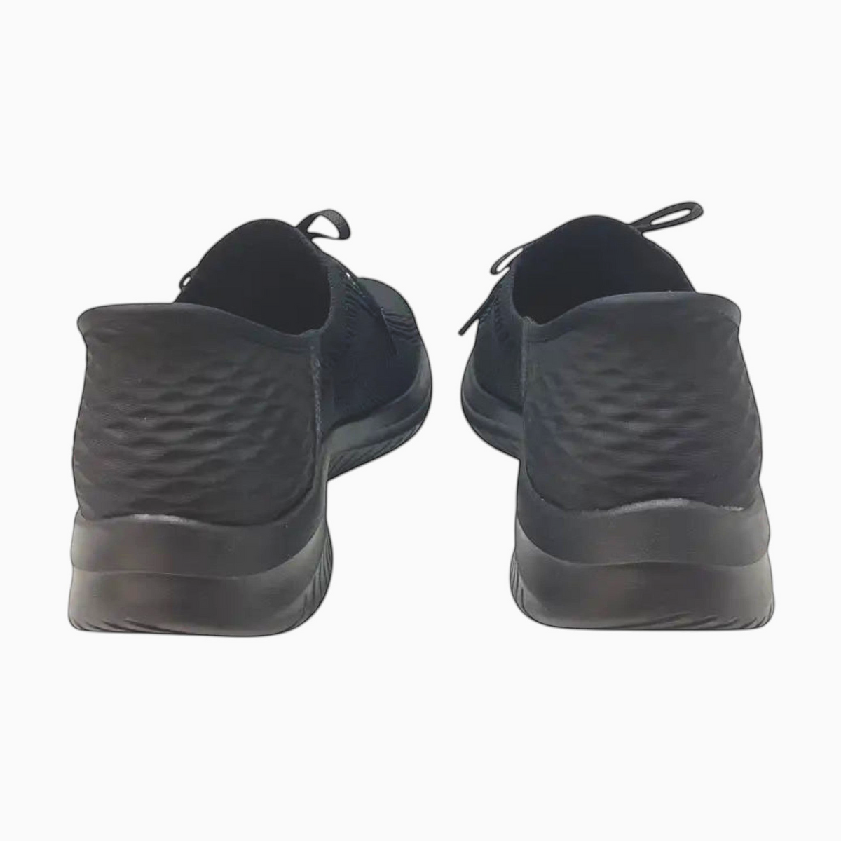 The Shoe Shop Skechers Ultra Flex 3.0 slip-in sneakers in black, showing the heel view with Heel Pillow technology.