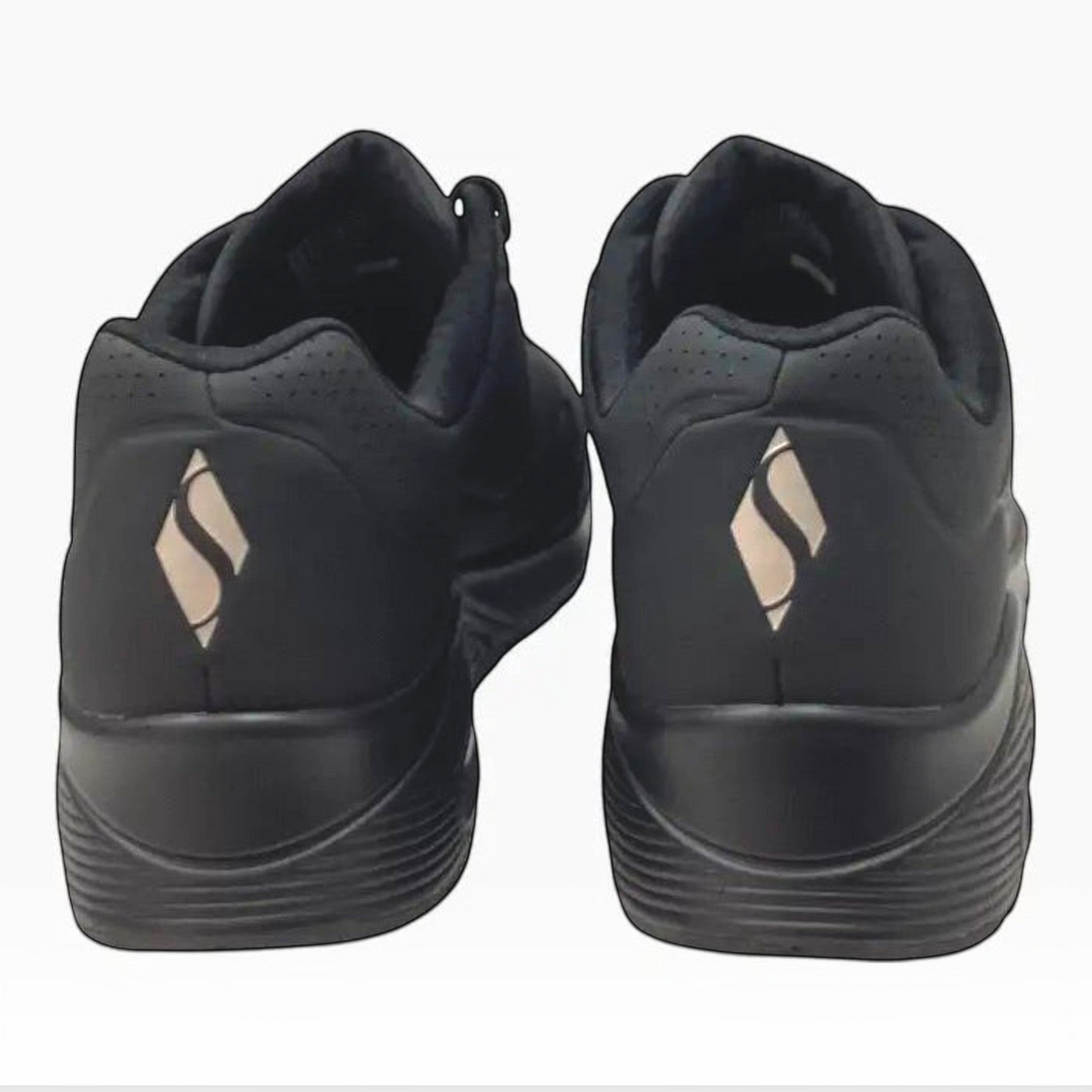 The Shoe Shop Skechers Uno black fashion sneakers showing the rear view with visible logo and air-cushioned midsole