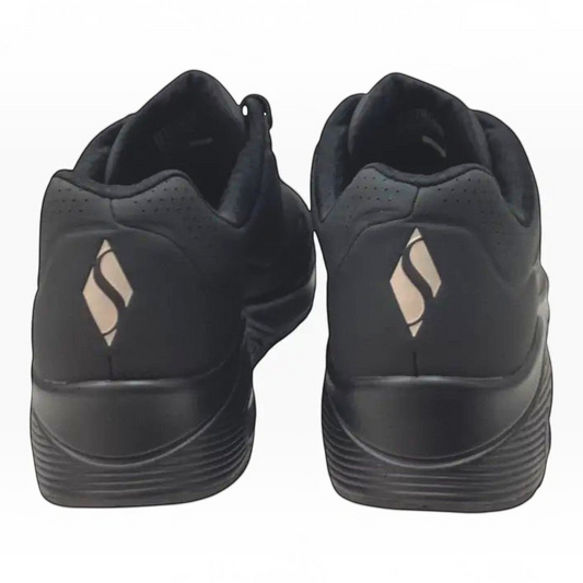 The Shoe Shop Skechers Uno Stand On Air wide sneakers in black with visible air-cushioned midsoles and logo detail.