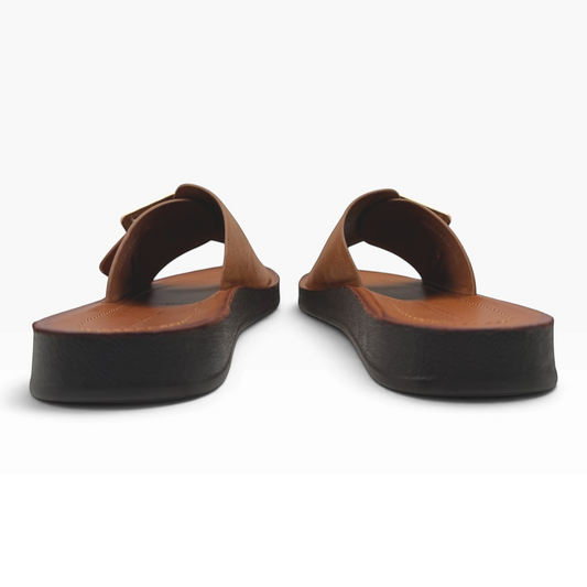 The Shoe Shop Skye Wide brown leather slide sandals with a thick dark sole viewed from the back