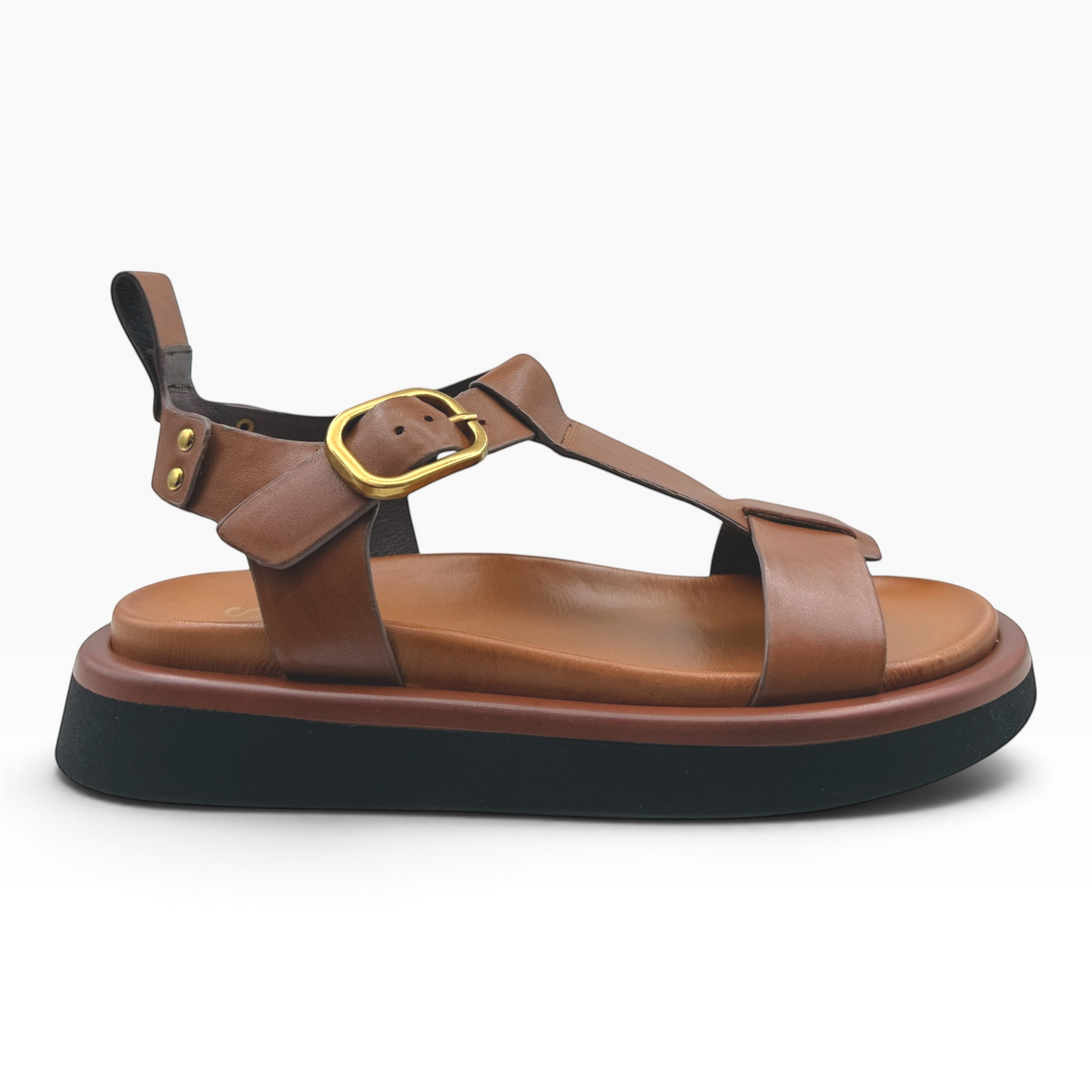 The Shoe Shop Slays brown leather platform sandals with a gold buckle and thick black sole, side view.