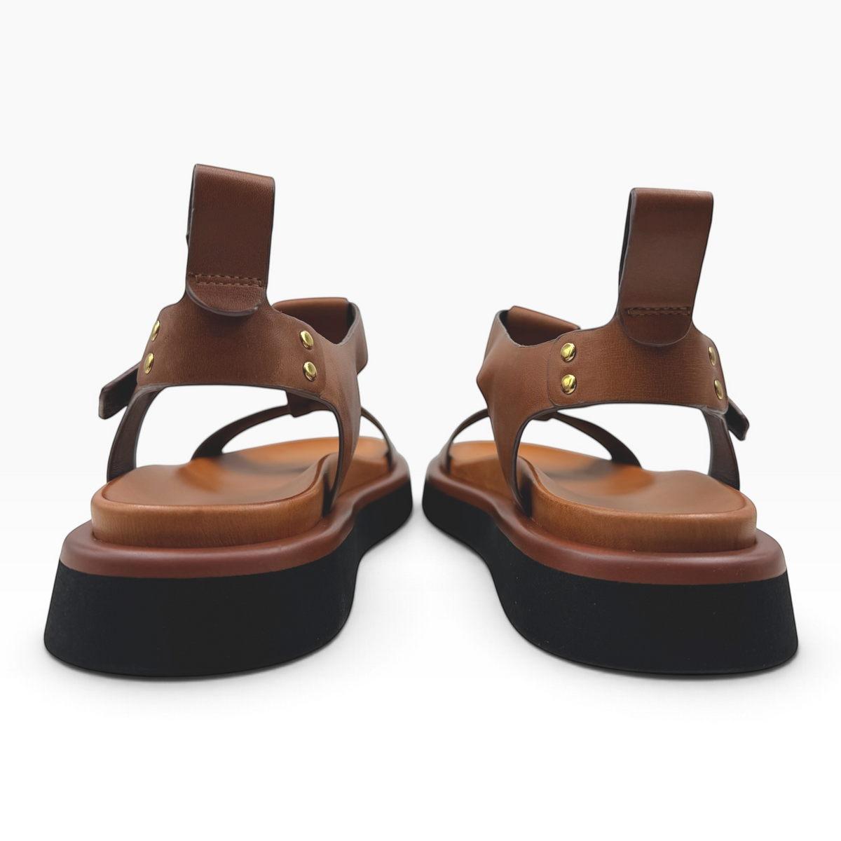 The Shoe Shop Slays brown leather platform sandals with gold stud details and back pull tabs