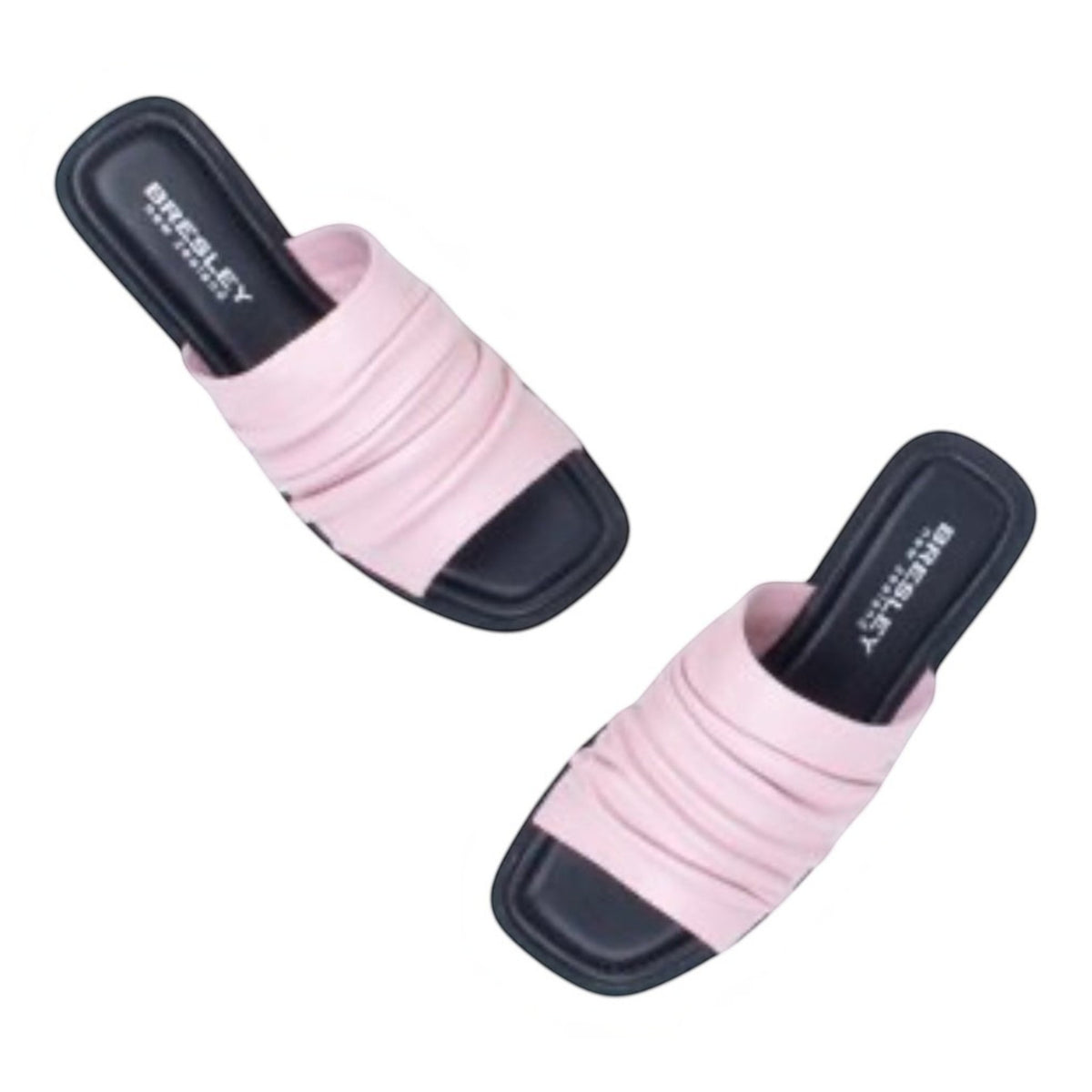 The Shoe Shop Slim slides featuring a soft pale pink ruched leather upper and a comfortable black cushioned footbed.