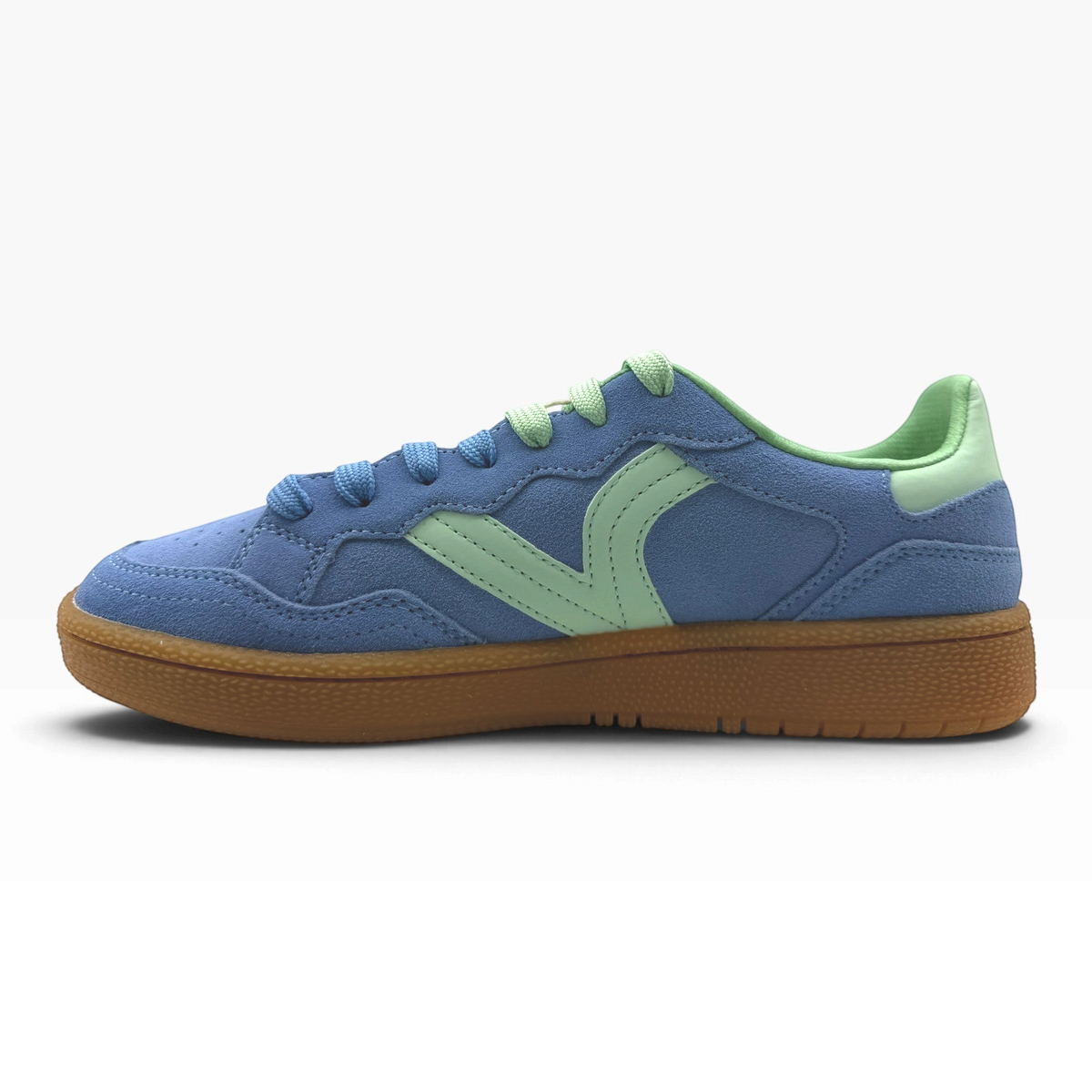 The Shoe Shop Smash Sneaker in blue and green suede with a gum rubber sole and perforated toe detail.