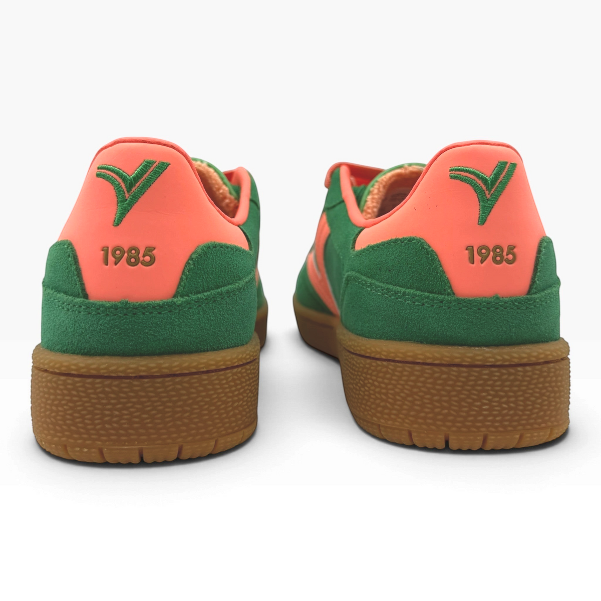 The Shoe Shop Smash Sneaker in Trebol green and coral suede with gum sole, rear view showing 1985 heel detail.
