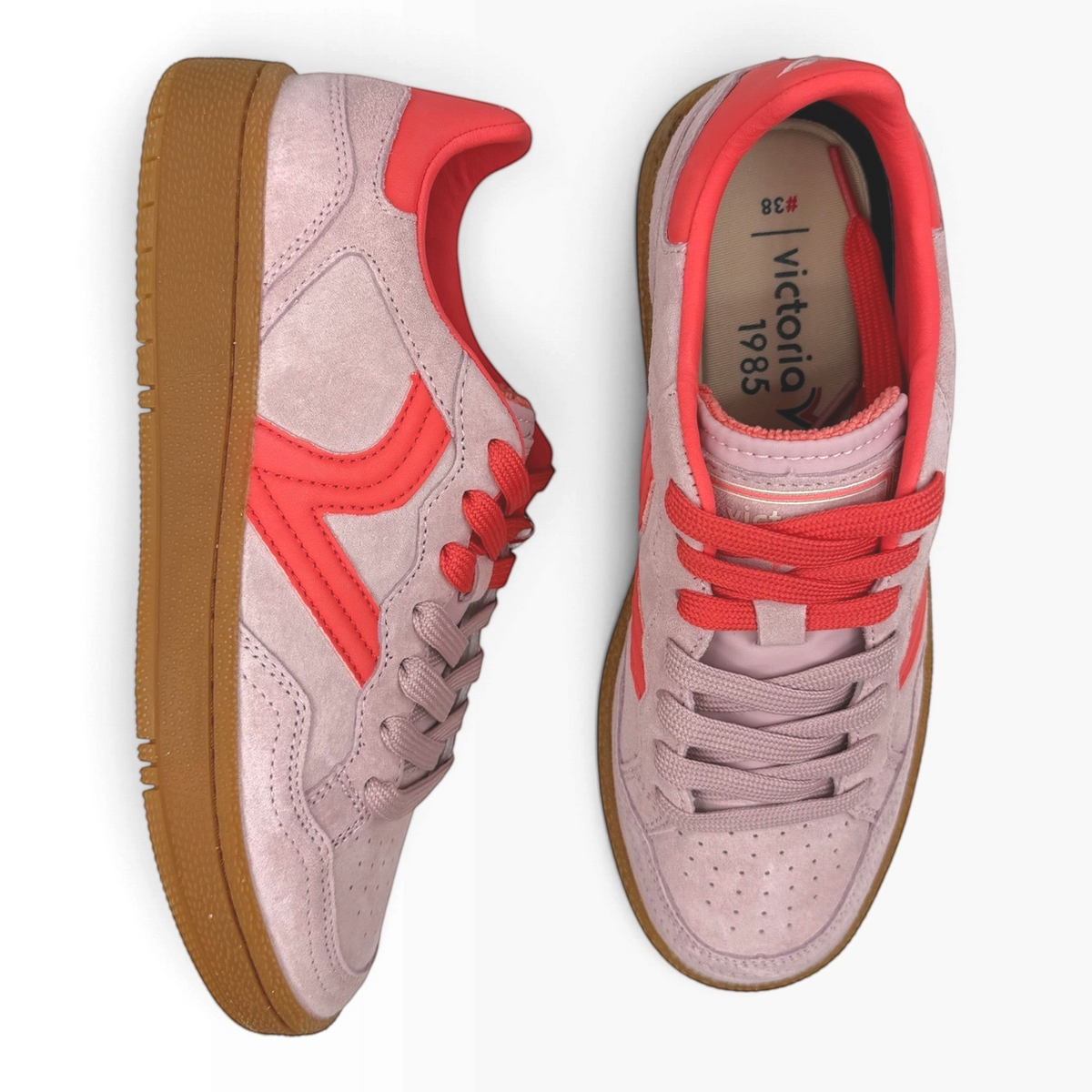 The Shoe Shop Smash Sneaker in rosa suede with red accents, perforated toe, and a classic gum rubber sole.