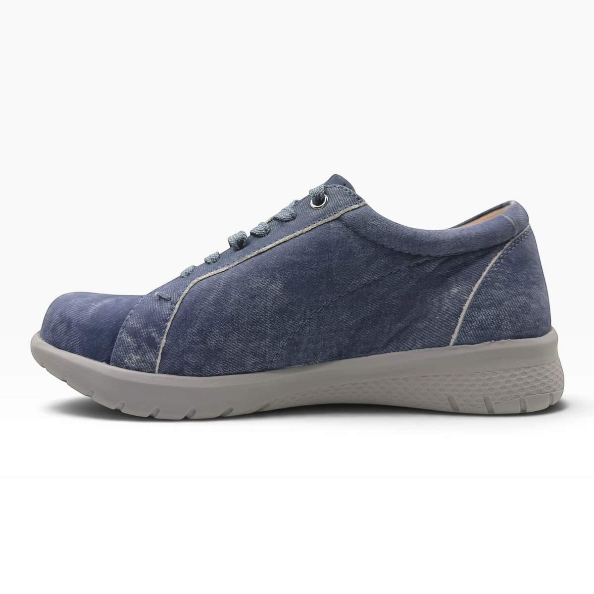 The Shoe Shop Solar XF navy leather sneaker with lace-up closure, side zip, and supportive grey slip-resistant sole.