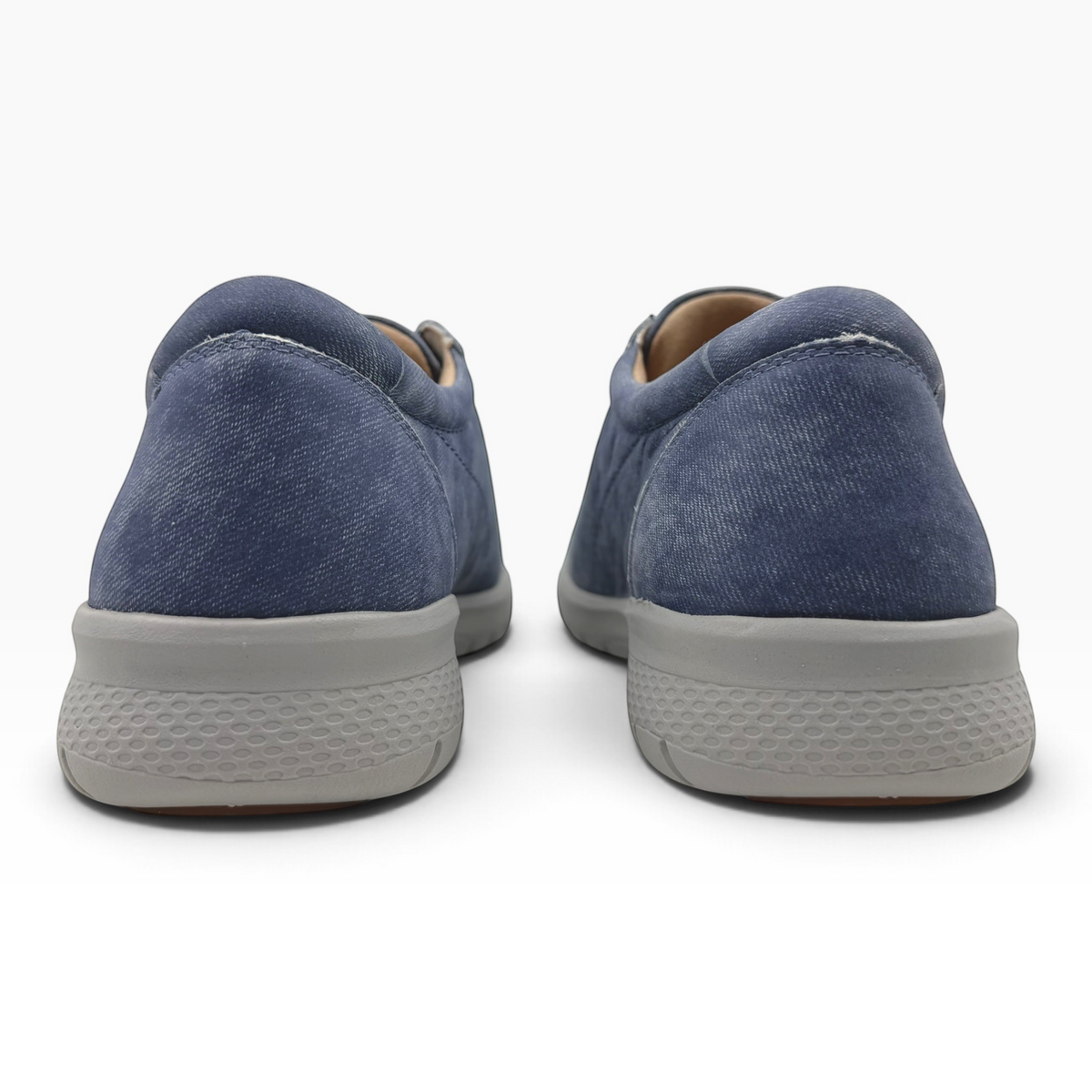 The Shoe Shop Solar XF navy blue leather sneakers viewed from the back showing the wide heel and textured grey sole.