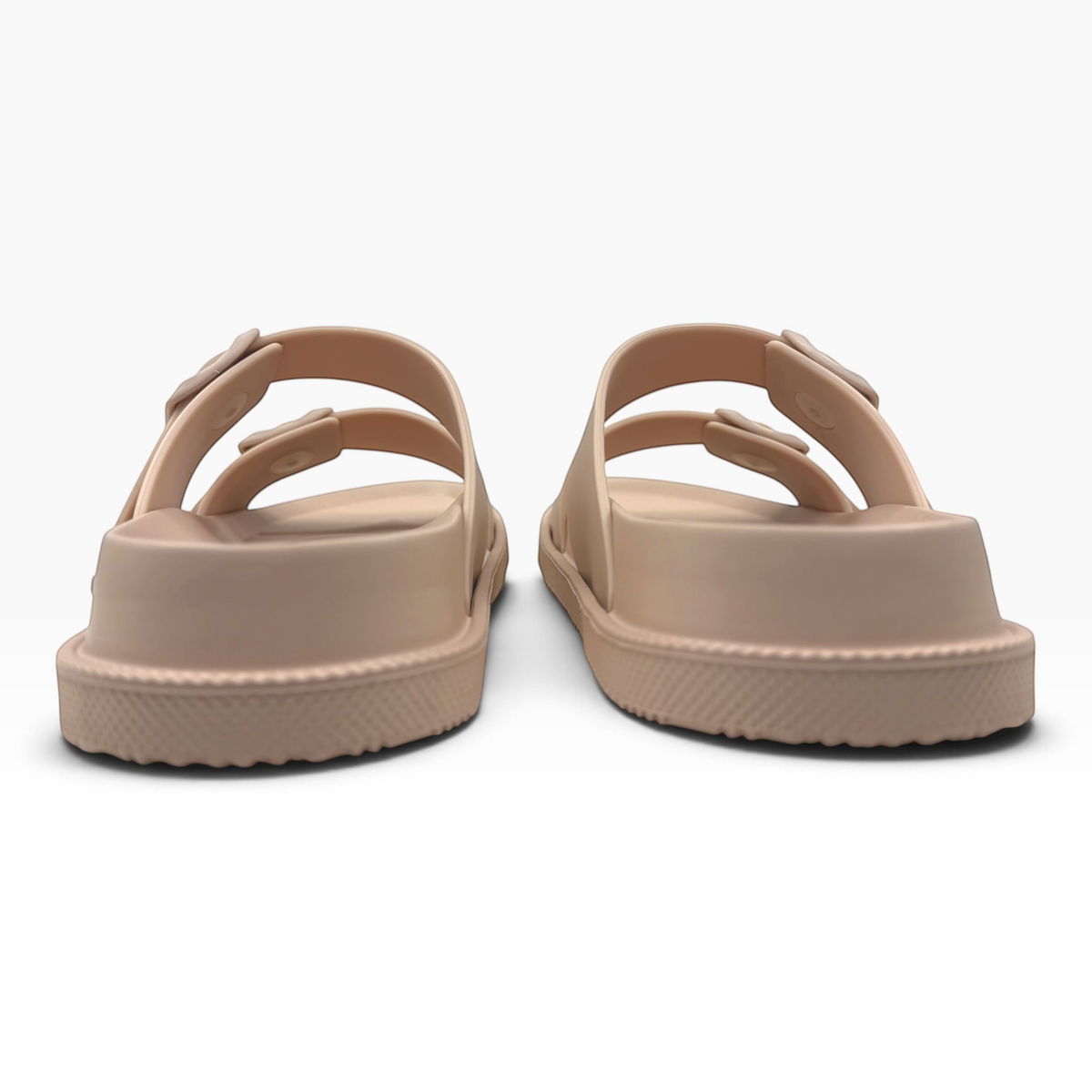 The Shoe Shop Soleseeker beige slide sandals with adjustable straps and a cushioned, water-friendly footbed.