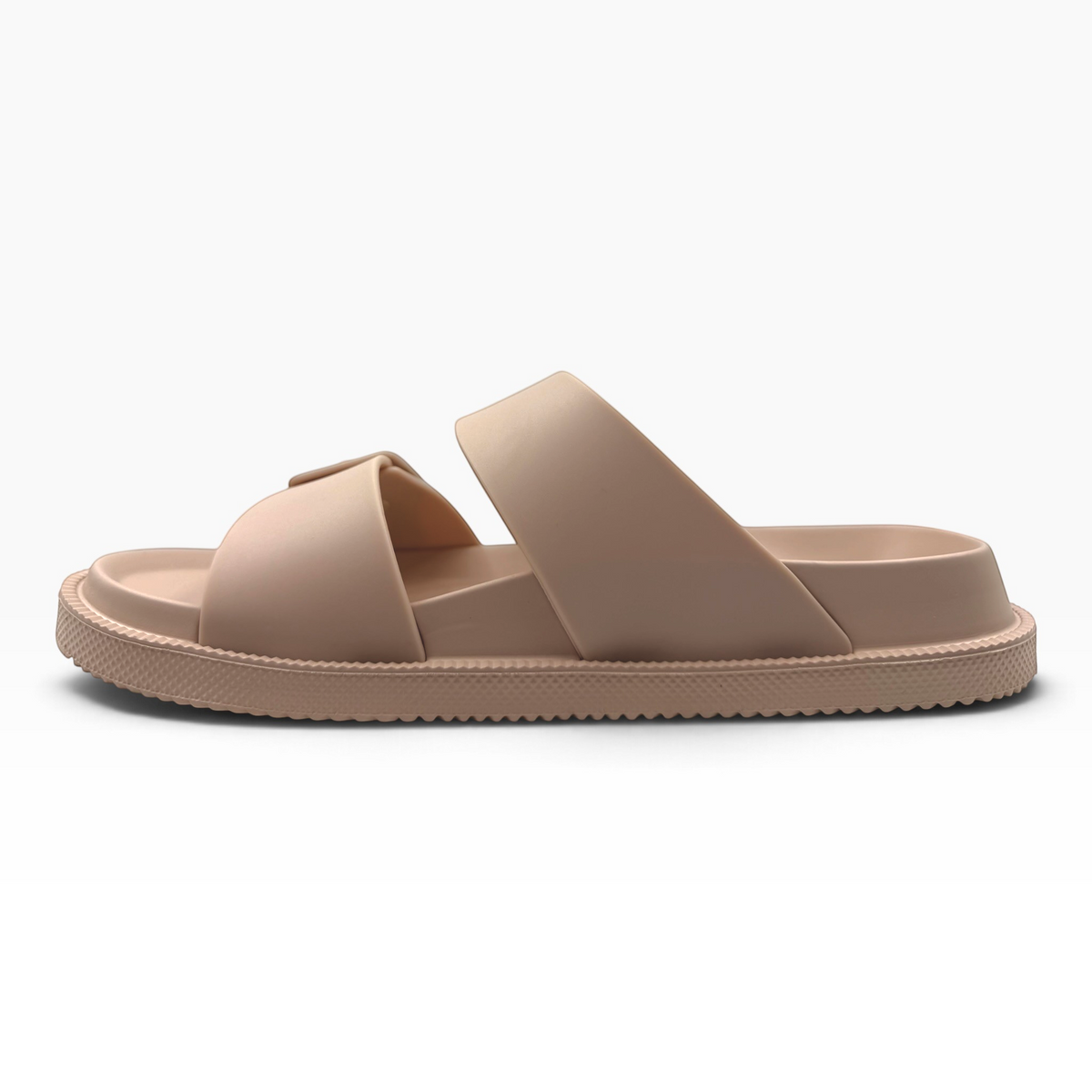 The Shoe Shop Soleseeker slide in beige with adjustable straps, cushioned footbed, and a lightweight flexible sole.