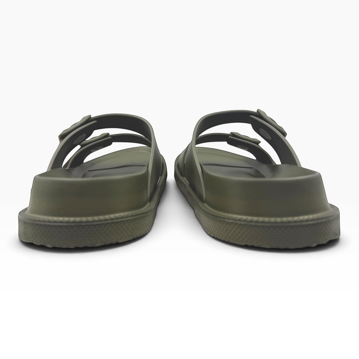 The Shoe Shop Soleseeker green slide sandals with adjustable straps and a cushioned, supportive footbed.
