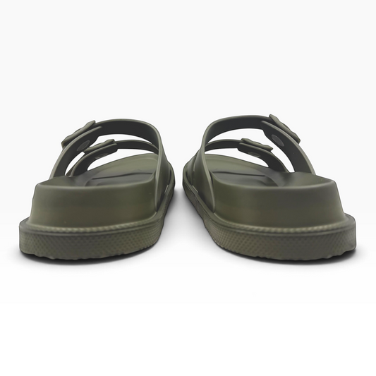 The Shoe Shop Soleseeker green slide sandals with adjustable straps and a cushioned, supportive footbed.