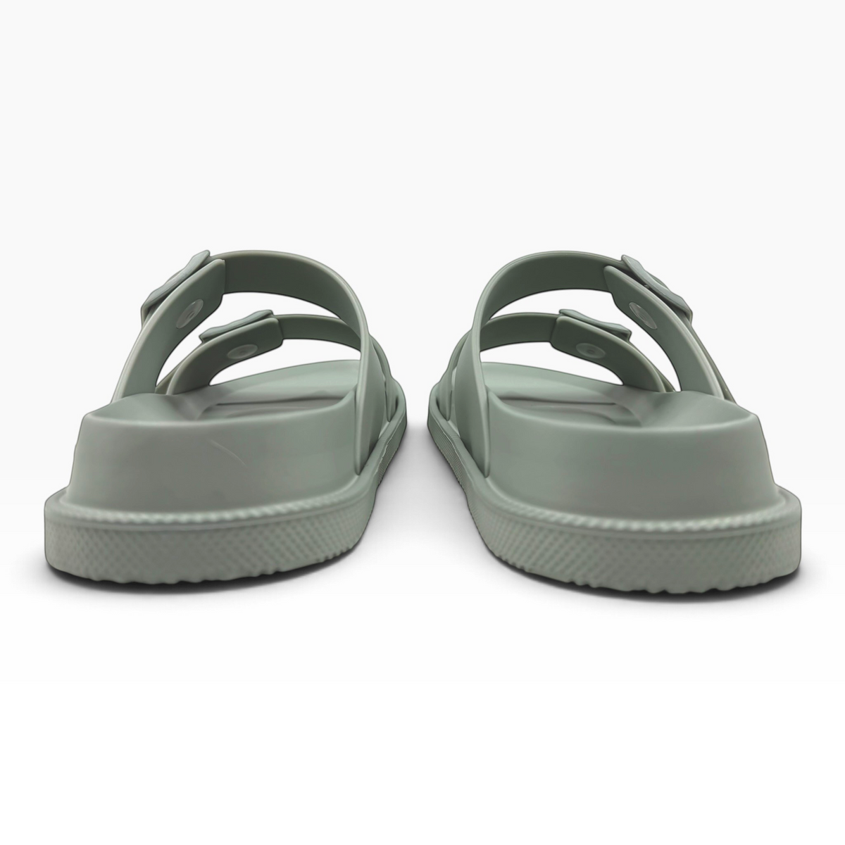 The Shoe Shop Soleseeker green slide sandals with adjustable straps and a supportive cushioned sole, rear view.