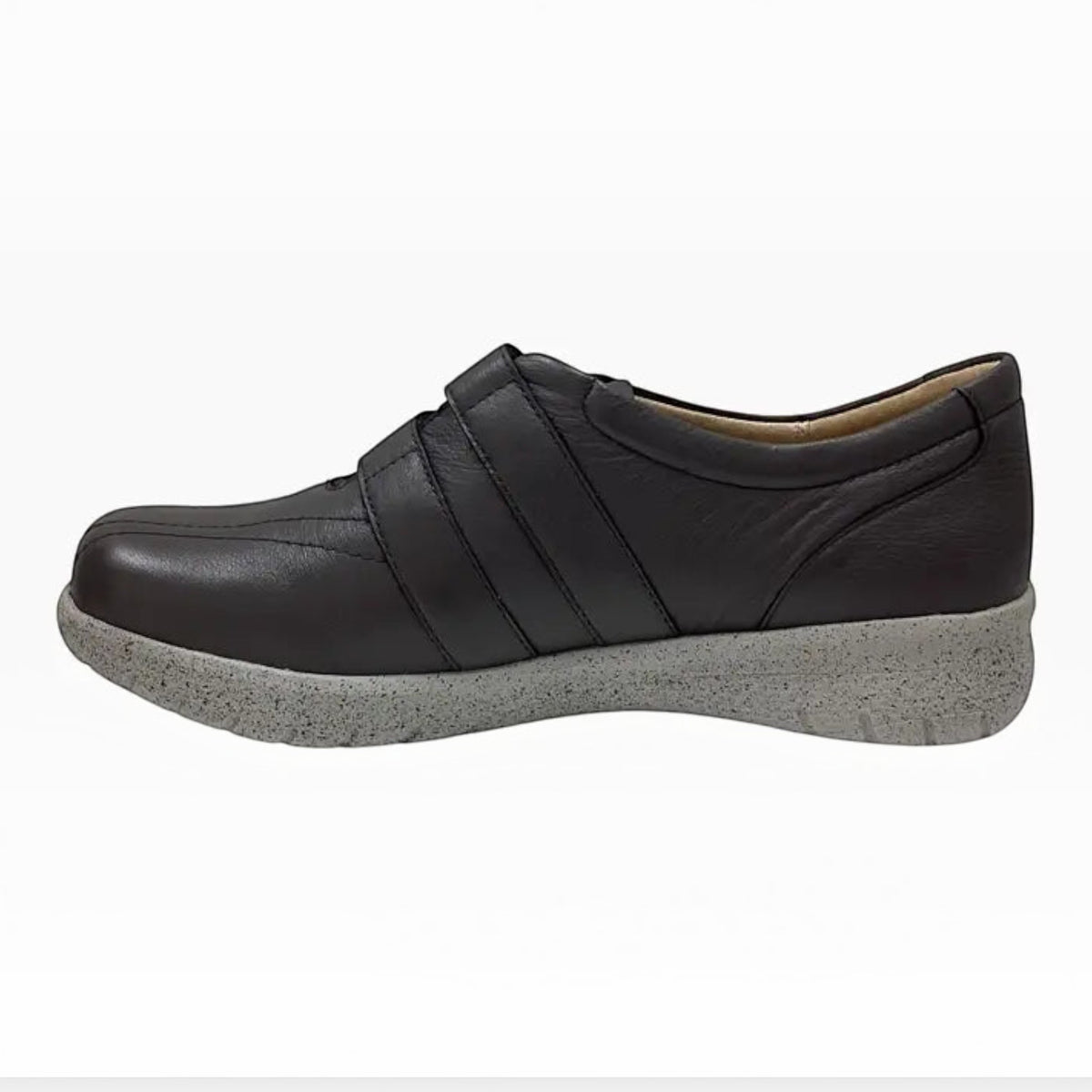 The Shoe Shop Sonnye sneaker in dark brown leather with a grey speckled comfort sole and side strap detail