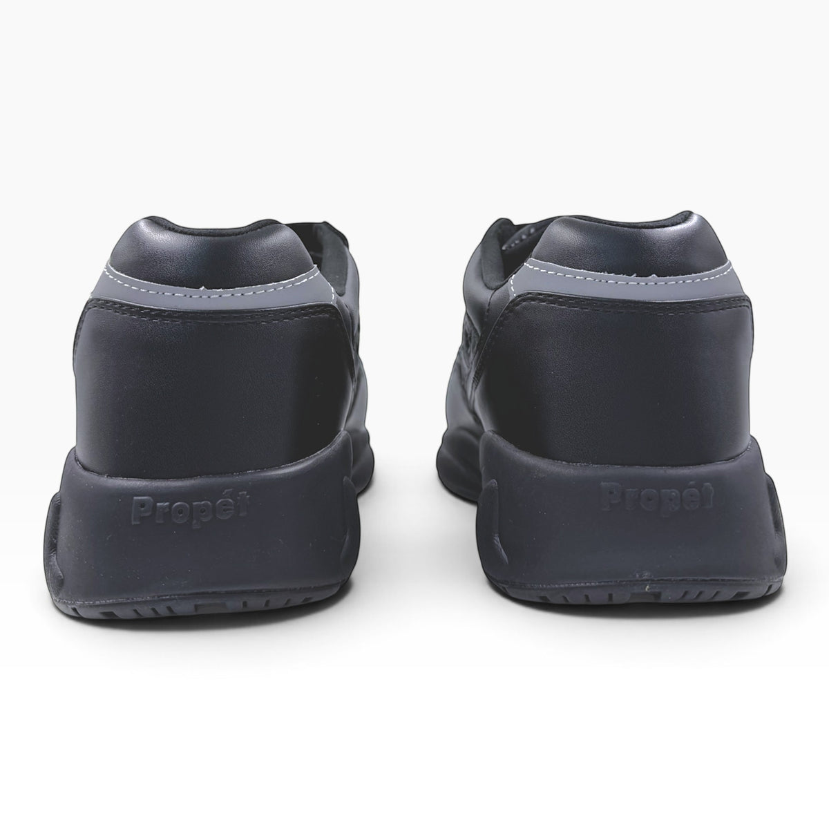 The Shoe Shop Stability X Strap 5E black orthopaedic sneakers viewed from the back with cushioned heels