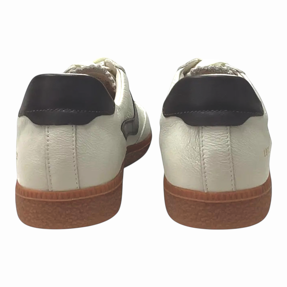 The Shoe Shop Staton retro sneakers in white leather with dark heel tabs and classic gum soles, rear view.