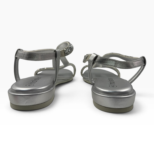The Shoe Shop Strut low wedge sandals in silver with sparkling rhinestone trim and a comfortable slingback strap.