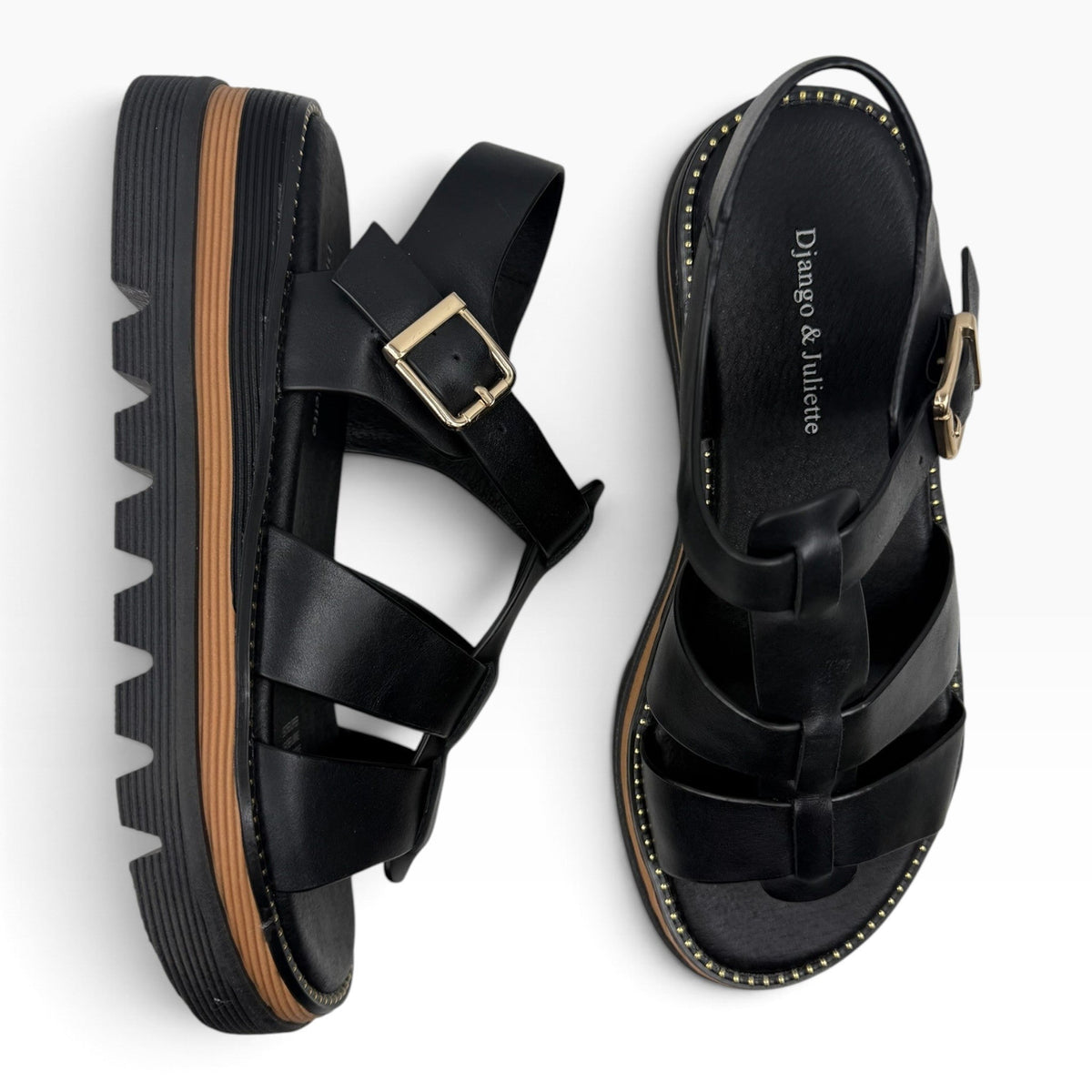 The Shoe Shop Django & Juliette Sylvera black leather platform sandals with gold buckle and ridged rubber sole.