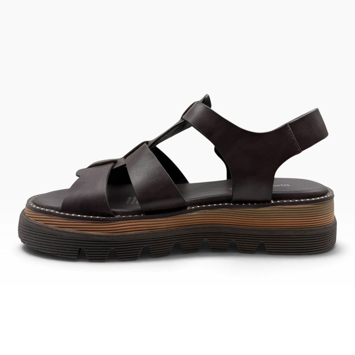 The Shoe Shop Sylvera platform sandal in dark brown leather with wide cross-straps and a chunky ridged rubber sole.