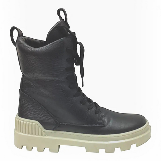 The Shoe Shop Rilassare Taigan black leather lace-up boot with a chunky cream rubber sole and padded collar.