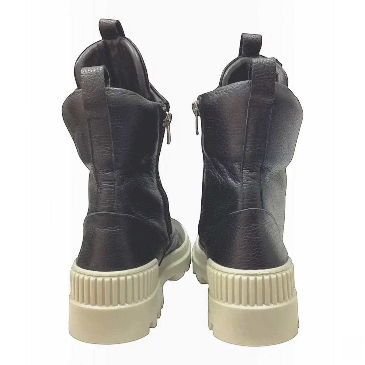 The Shoe Shop Taigan black leather mid-length boots with chunky cream rubber soles and rear pull tabs, back view.