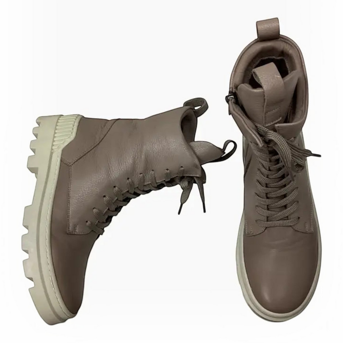 The Shoe Shop Taigan taupe leather lace-up boots with chunky cream rubber soles and inner zip detail.