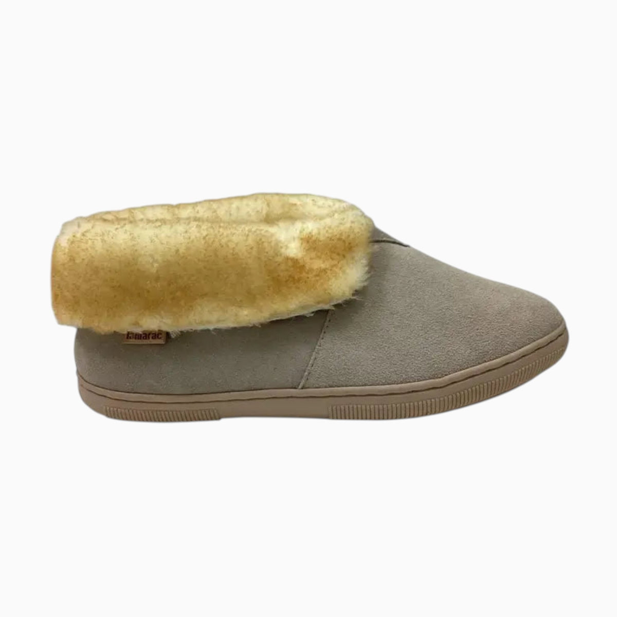 The Shoe Shop Tamarac Julie women's sand leather slipper with a warm lambswool lining and durable rubber sole.