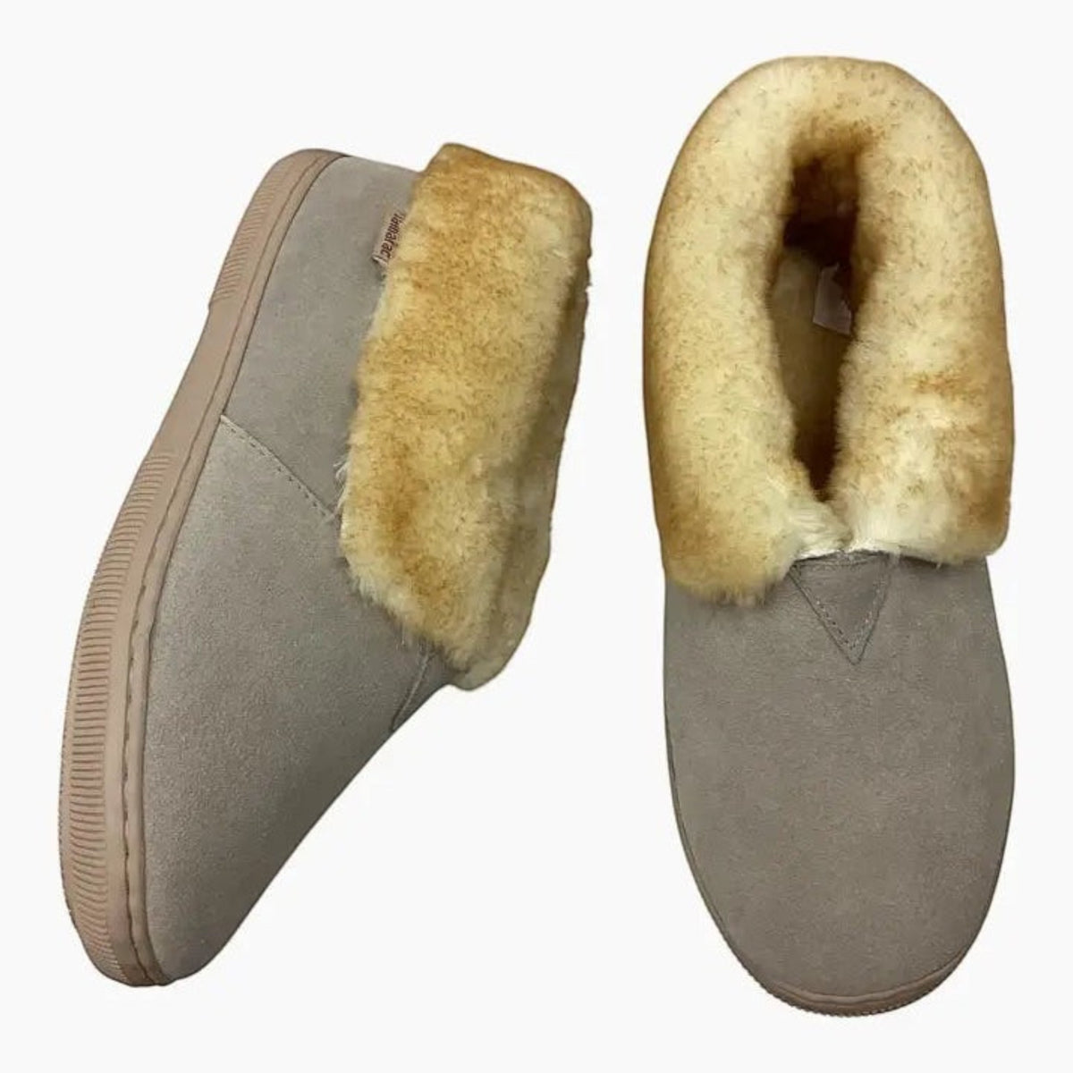 The Shoe Shop Tamarac Julie slippers in sand leather with a plush lambswool lining and durable rubber soles.