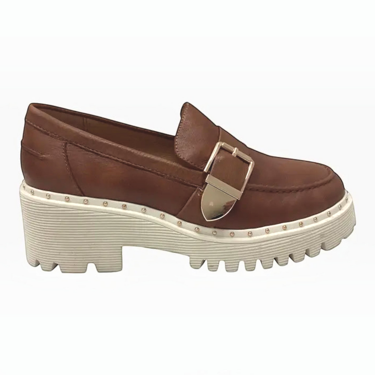 The Shoe Shop Belle Scarpe Ric tan leather loafer with gold buckle, studded trim, and chunky off-white lug sole.