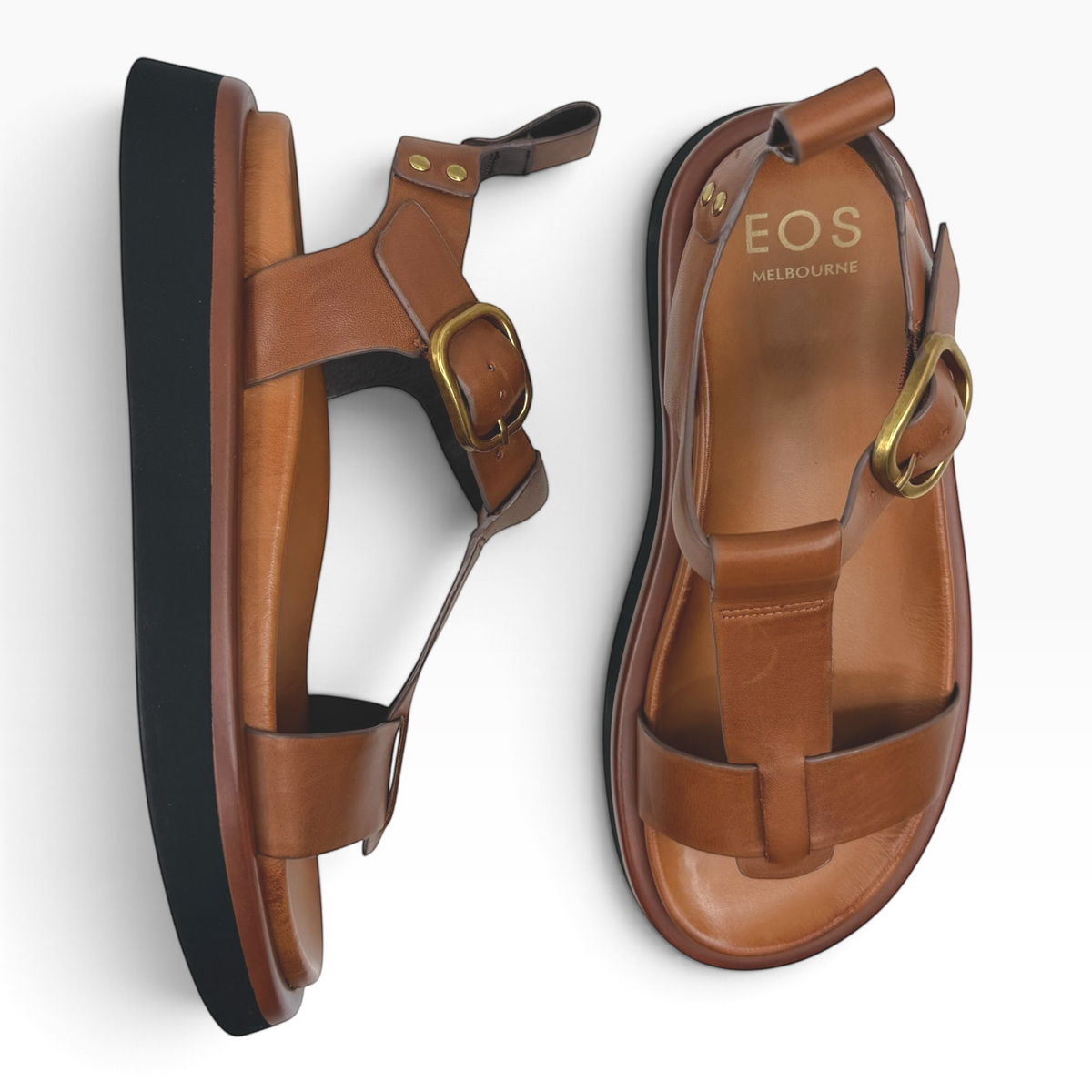 The Shoe Shop Slays tan leather platform sandals with gold buckle detail and black sole