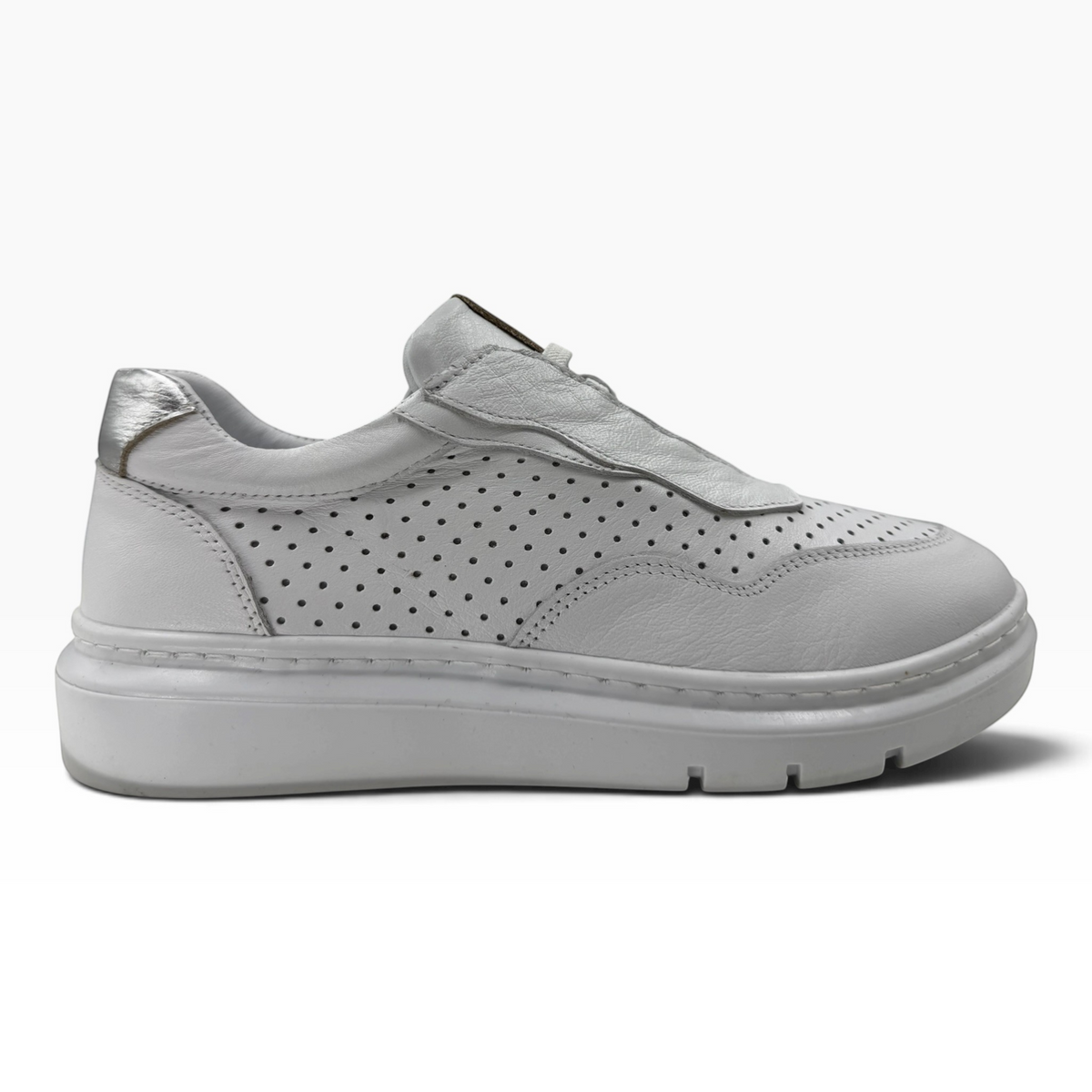 The Shoe Shop Taurus sneaker in white leather with perforated side panels and a metallic silver heel detail.