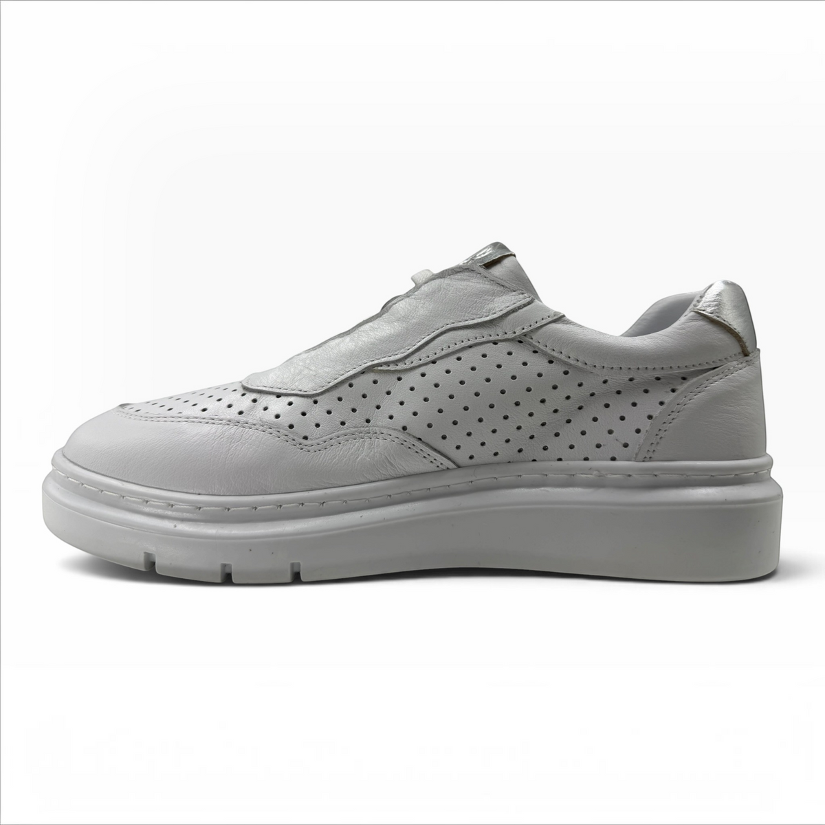 The Shoe Shop Taurus sneaker in white leather with perforated side panels and a thick rubber sole