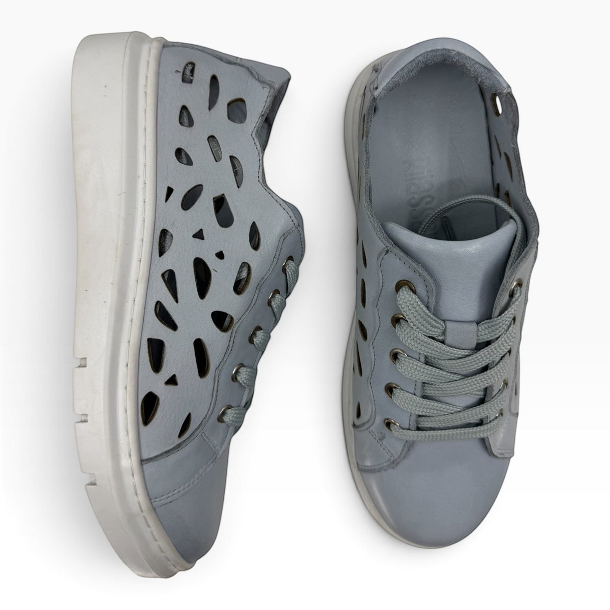 The Shoe Shop Tira sneakers in grey faux leather with laser-cut perforated panels and a white cushioned platform sole.