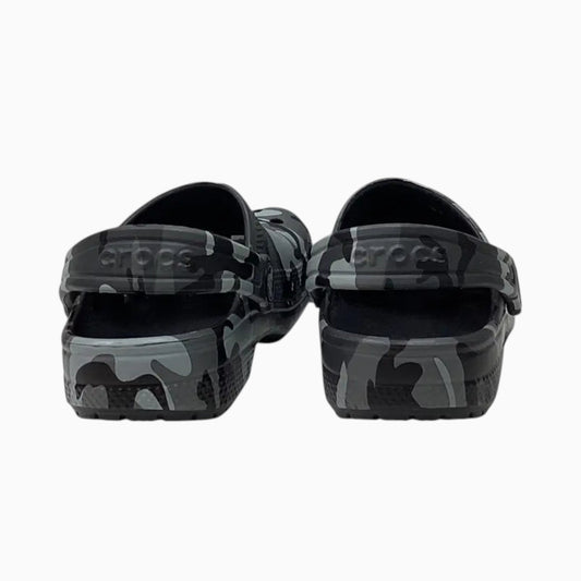 The Shoe Shop toddler Crocs Classic Clogs in a grey and black camo print with pivoting heel straps, rear view.