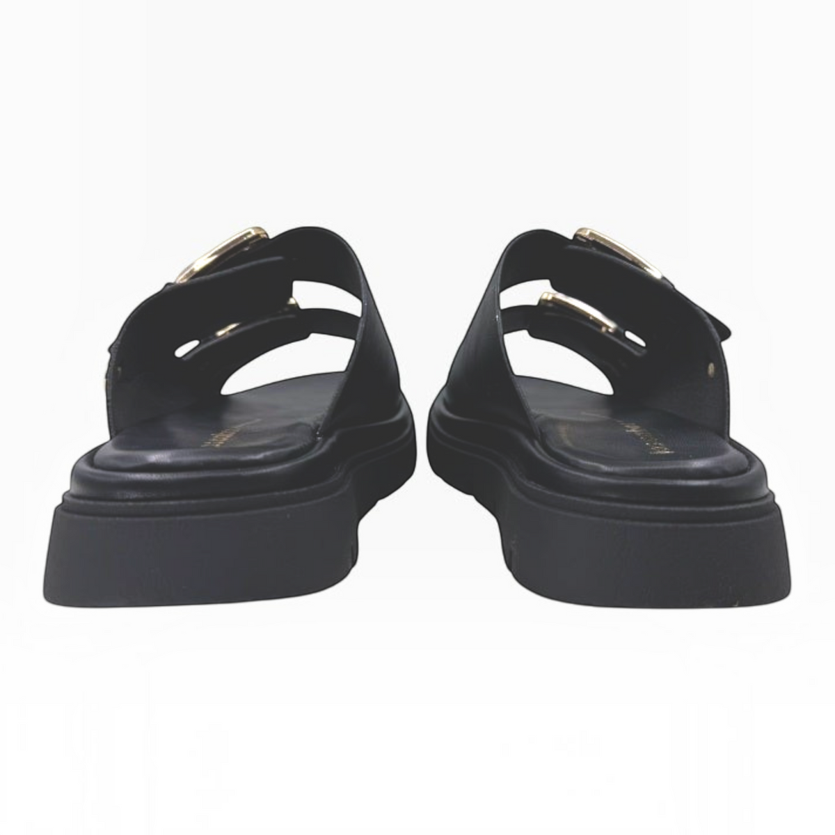 The Shoe Shop Toledo Slide black sandals with twin adjustable buckle straps, gold hardware, and a chunky lug sole.