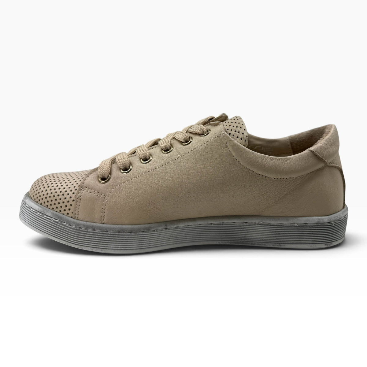 The Shoe Shop Tommie Perf beige leather sneaker with perforated detailing, lace-up front, and durable rubber sole.