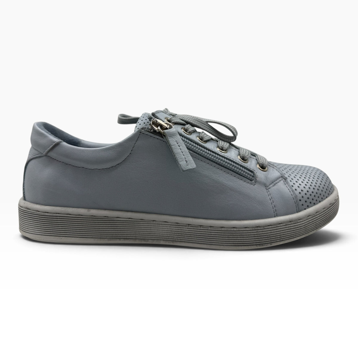 The Shoe Shop Tommie Perf grey leather sneaker with perforated detailing, side zip, and durable rubber sole.