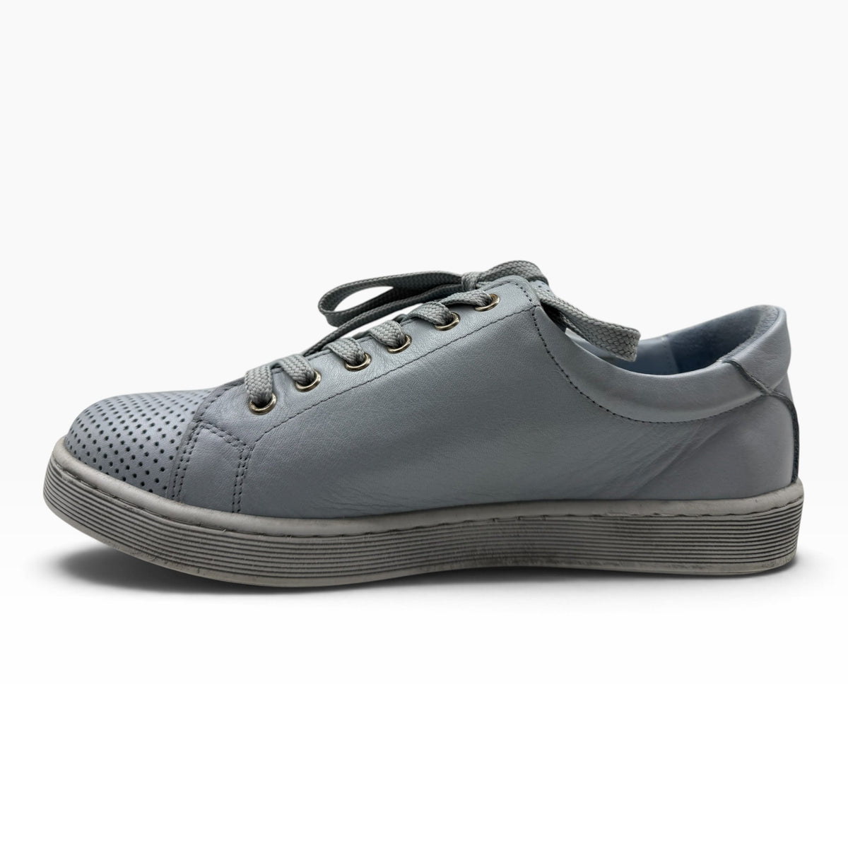 The Shoe Shop Tommie Perf grey leather sneaker with perforated toe, lace-up closure, and durable rubber sole.