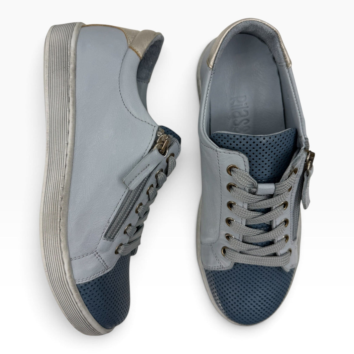 The Shoe Shop Tommie Perf leather sneakers in grey and blue with perforated details, side zip, and lace-up closure.